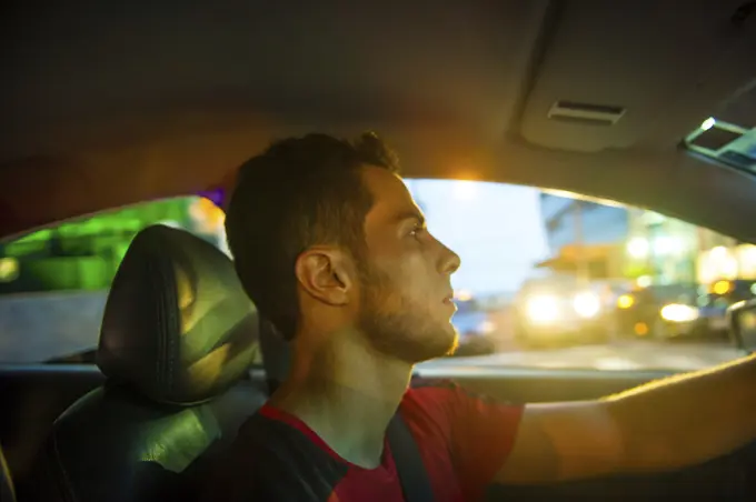 Man in car, Rio de Janeiro, Brazil