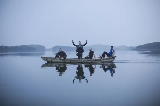 Men on a boat ride, Vietnam