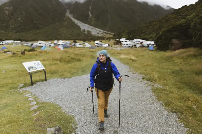 Hiker walking on trail path, Wanaka, Taranaki, New Zealand