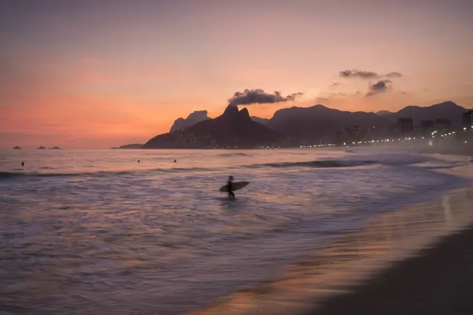 Brazil, Rio de Janeiro, Beach and sea waves at sunset