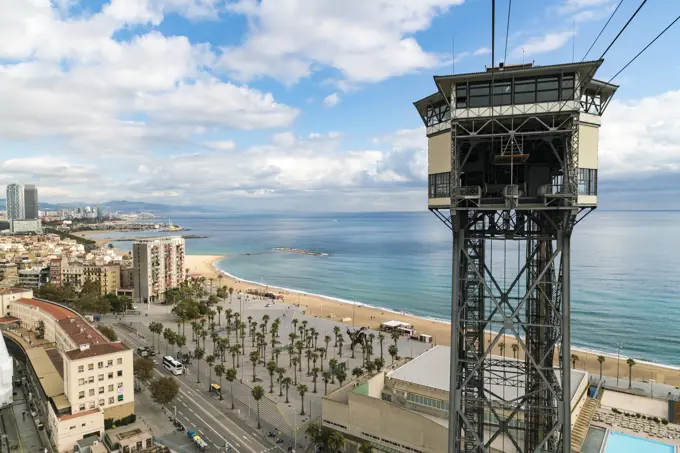 Spain, Catalonia, Barcelona, Cable car tower station by La Barceloneta beach