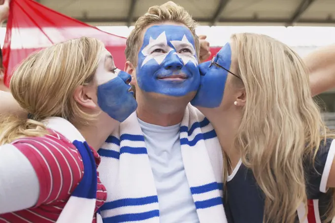 Footballer supporters kissing