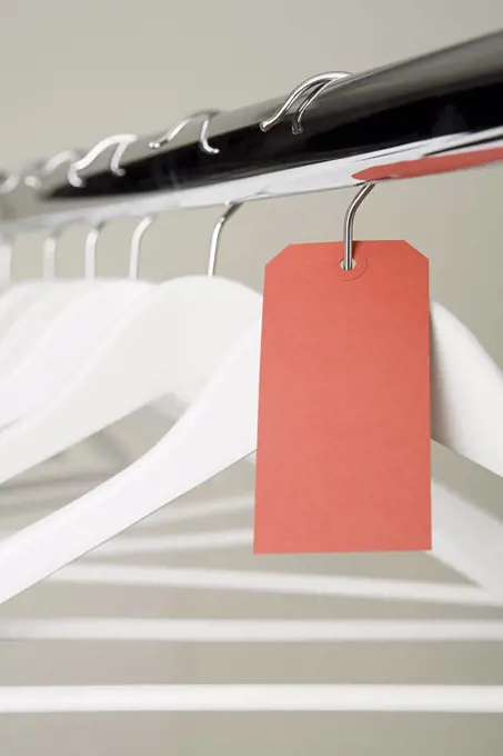 Red label on a clothes hanger