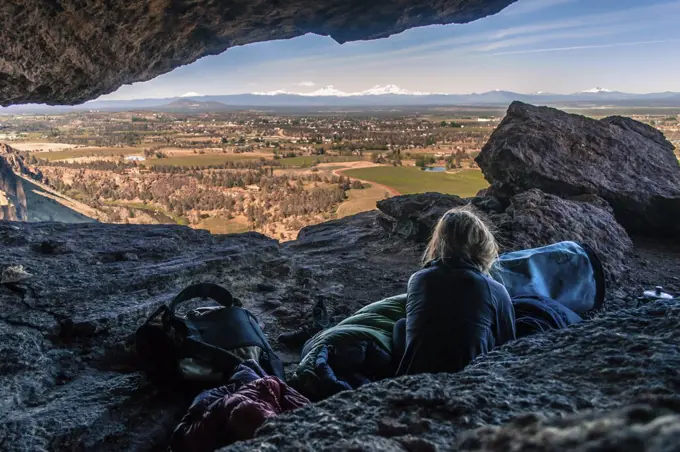 Rock climber on summit, Smith Rock State Park, Oregon, USA