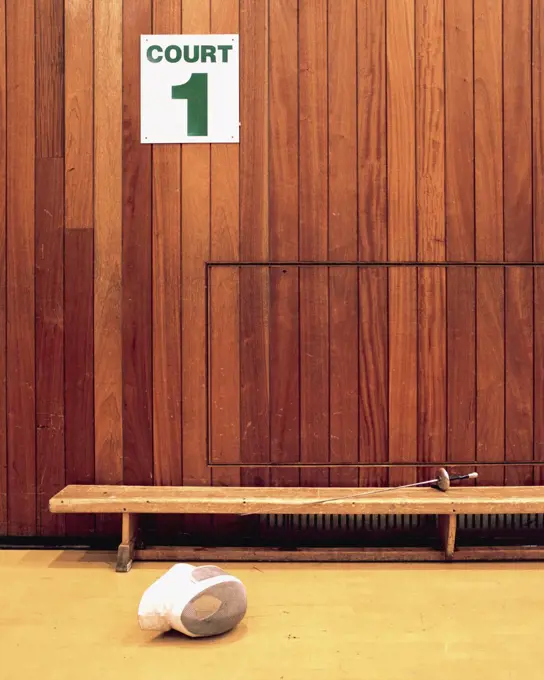 Fencing mask in sport court