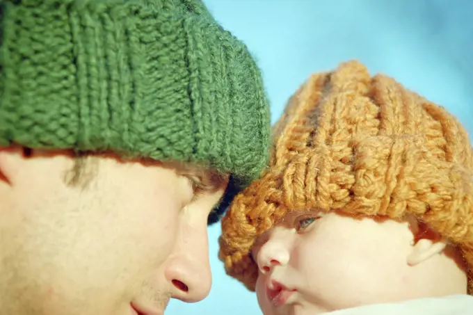 Dad with baby in woolie hats