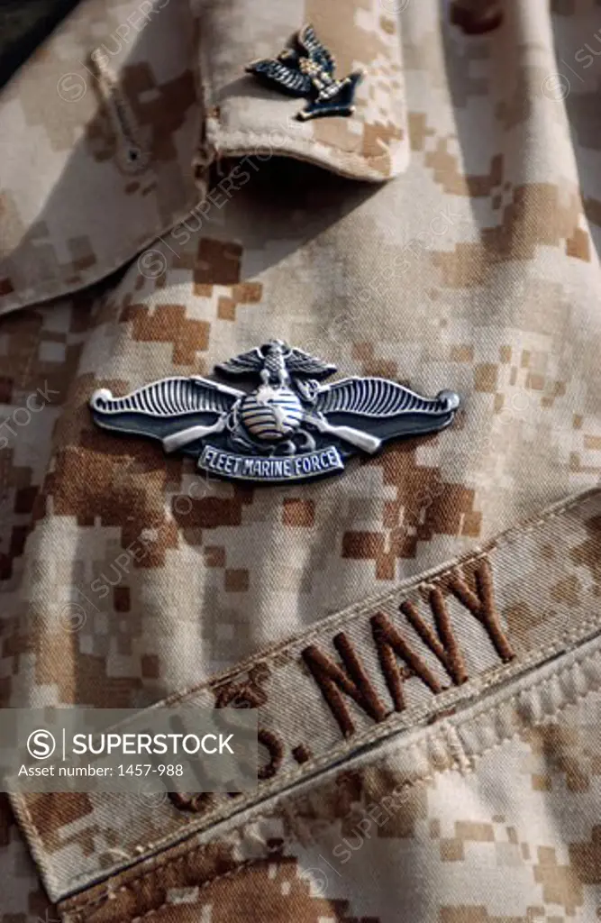 Close-up of a Fleet Marine Force Enlisted Warfare Specialist Insignia on a military uniform