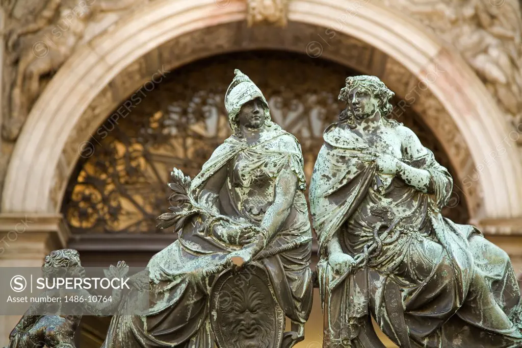 Low angle view of statues at the entrance of a campanile, Piazza San Marco, Venice, Italy