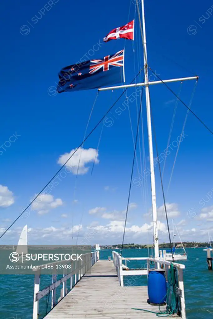 Flags fluttering at the Devonport Yacht Club, Devonport, Auckland, North Island, New Zealand