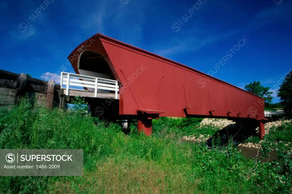 Covered bridge over a stream, Holliwell Covered Bridge, Winterset, Iowa, USA