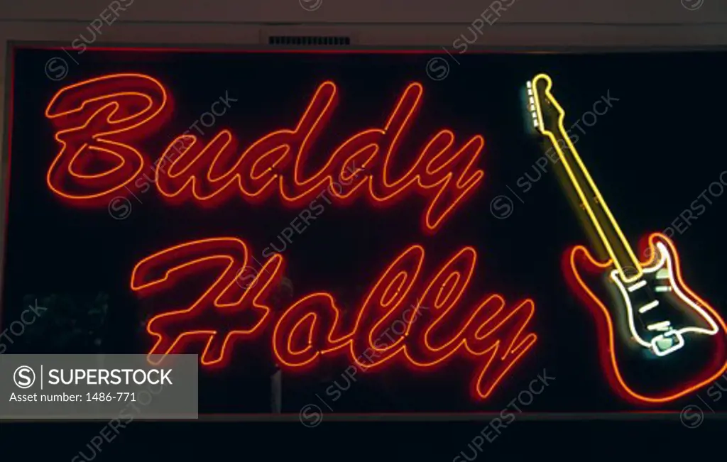 Close-up of a neon sign lit up at night, Buddy Holly Center, Lubbock, Texas, USA