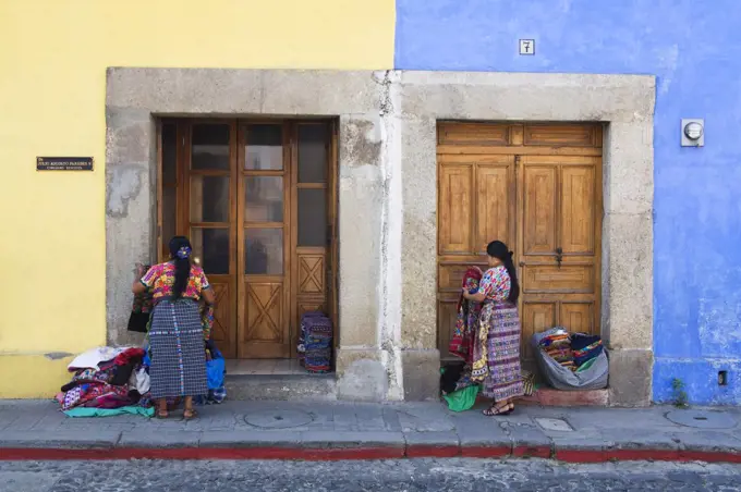 Street vendors in front of a building, Antigua, Guatemala