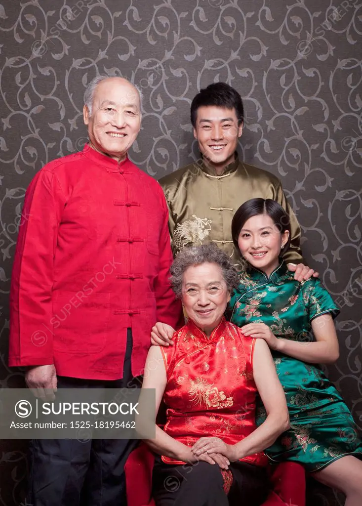 Portrait of grandparents and adult grandchildren in traditional Chinese clothing