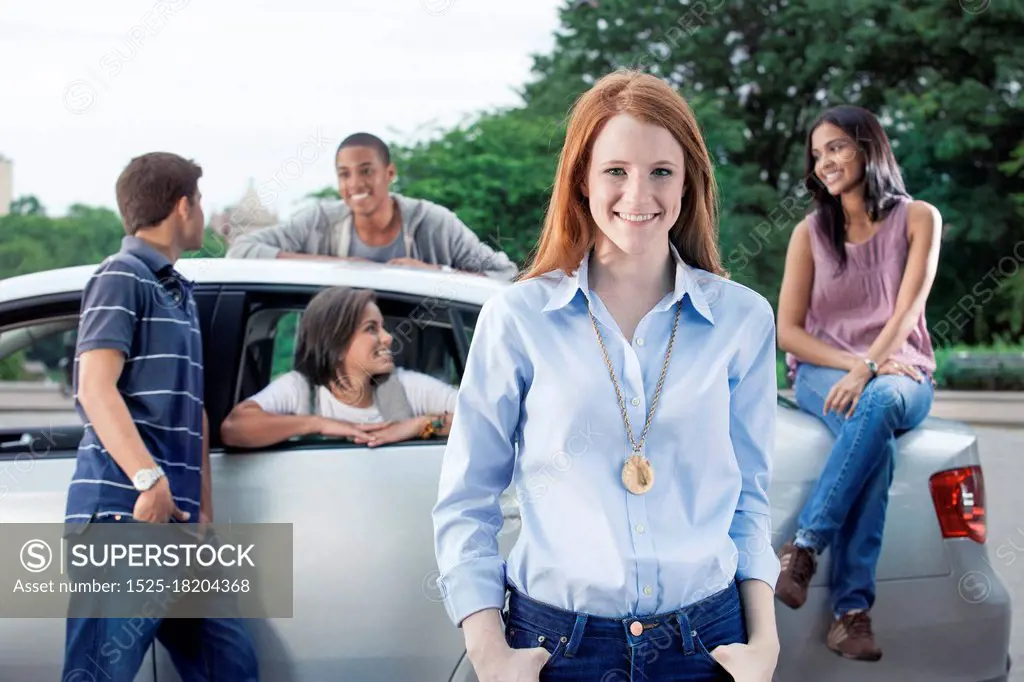 Teenagers with car