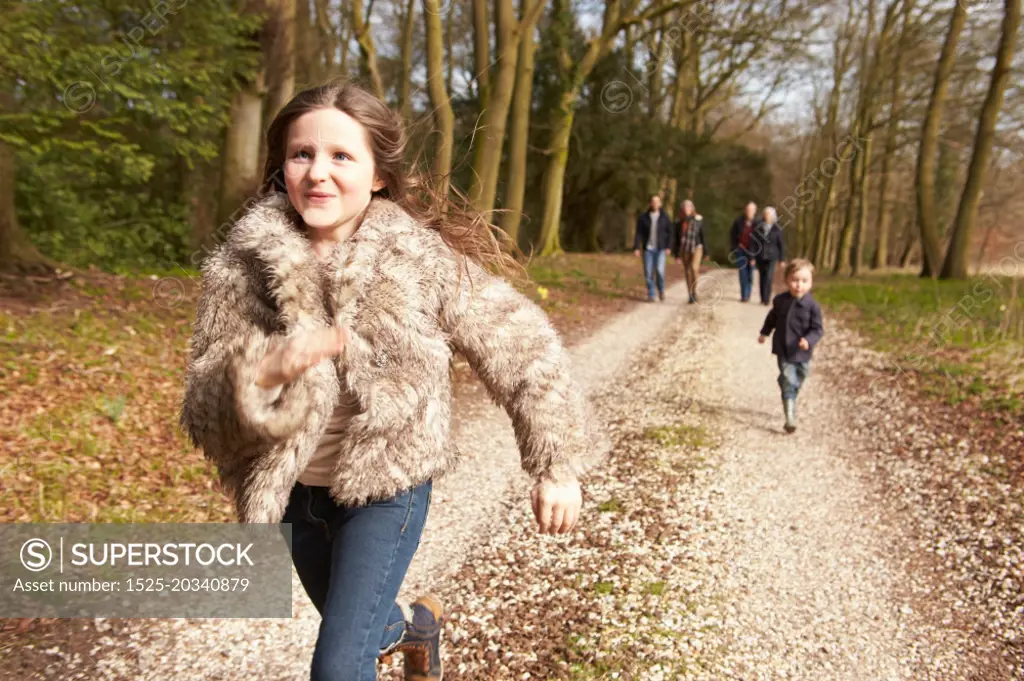 Multi Generation Family On Countryside Walk