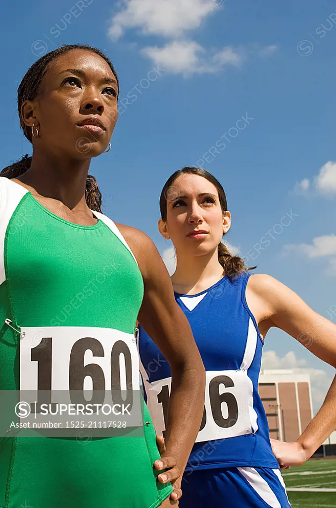 Two female track athletes