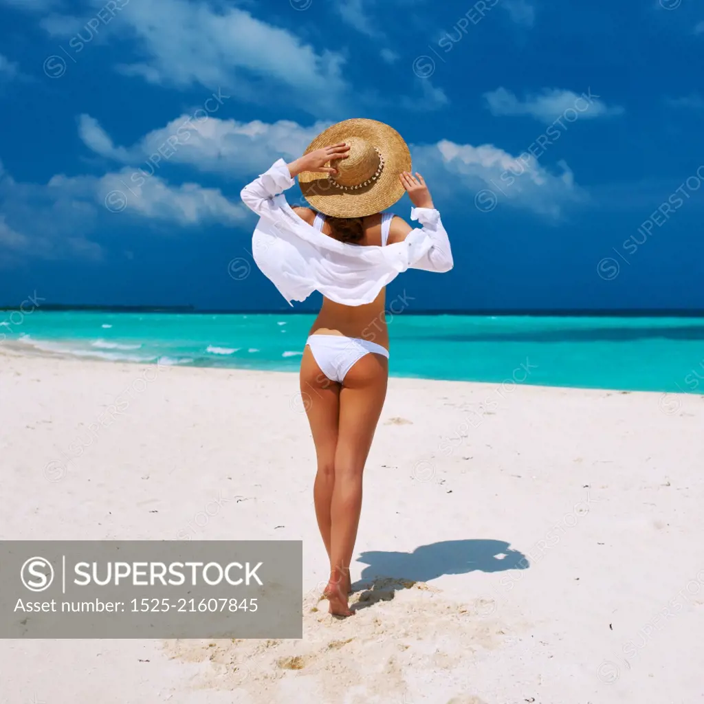 Woman in bikini at tropical beach