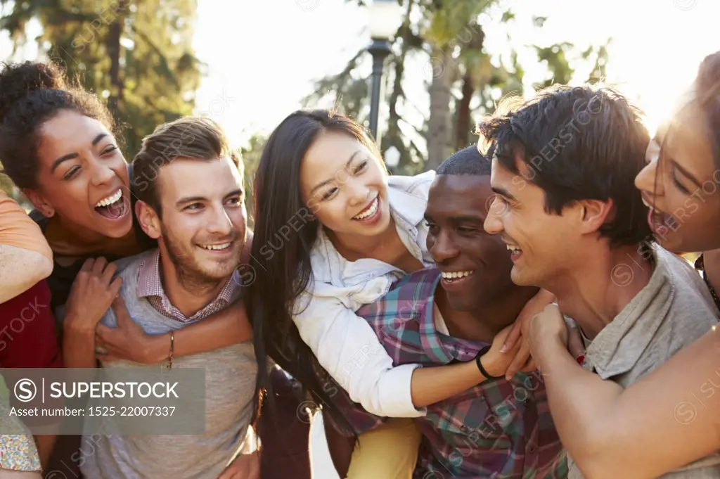 Group Of Friends Having Fun Together Outdoors