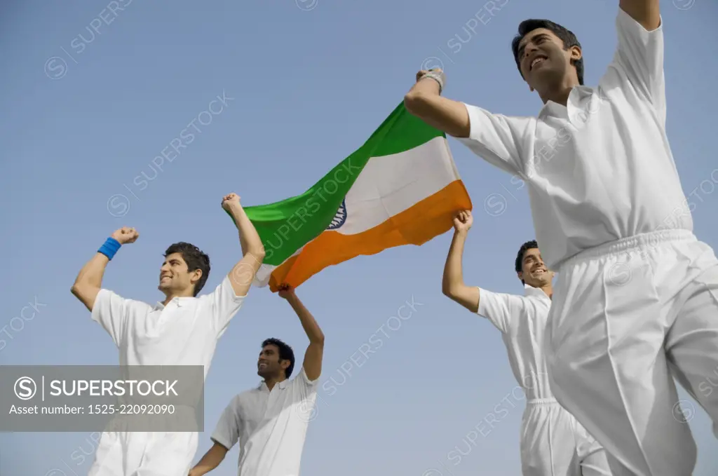 Players holding the national flag 