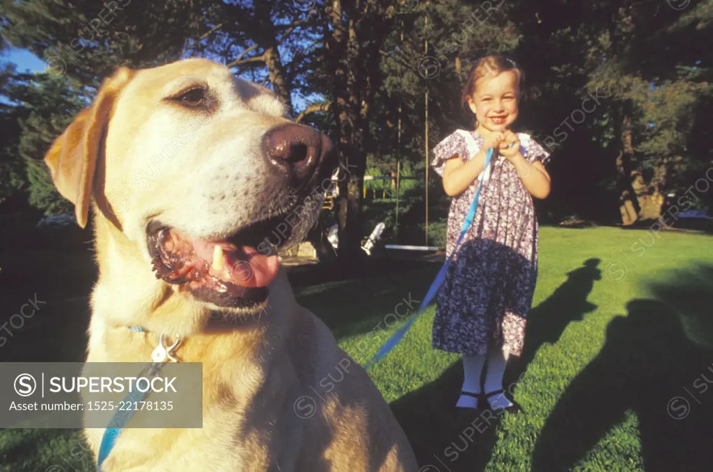 Little Girl With Dog on Leash