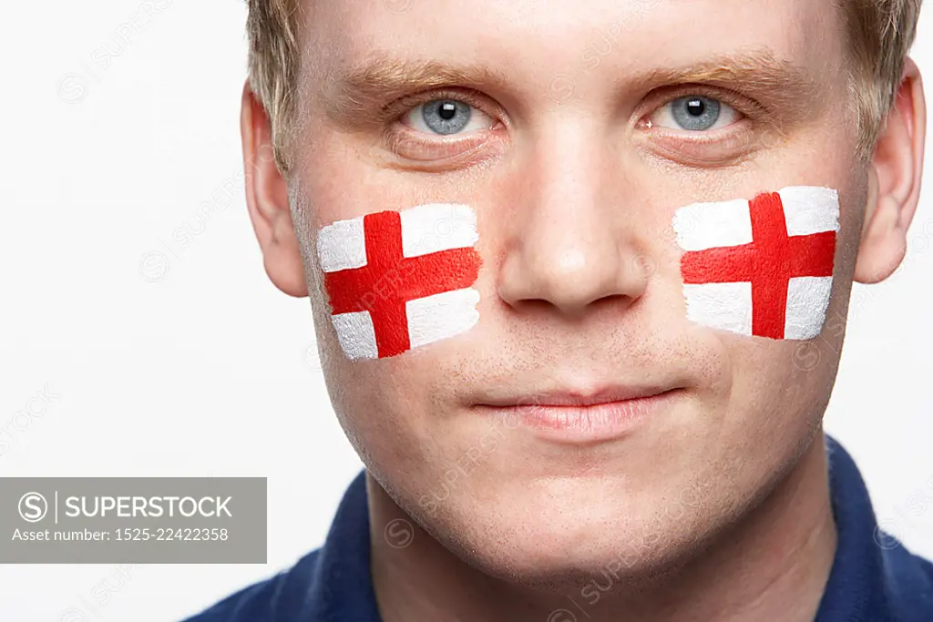 Young Male Sports Fan With St Georges Flag Painted On Face