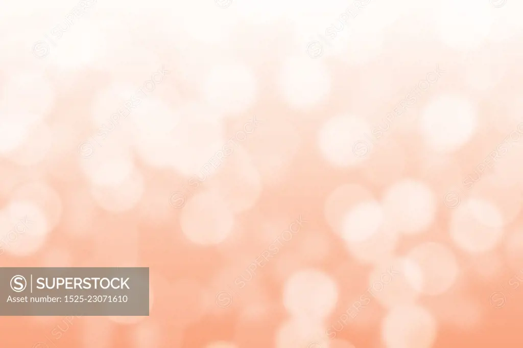 Abstract circular peach and white light bokeh background