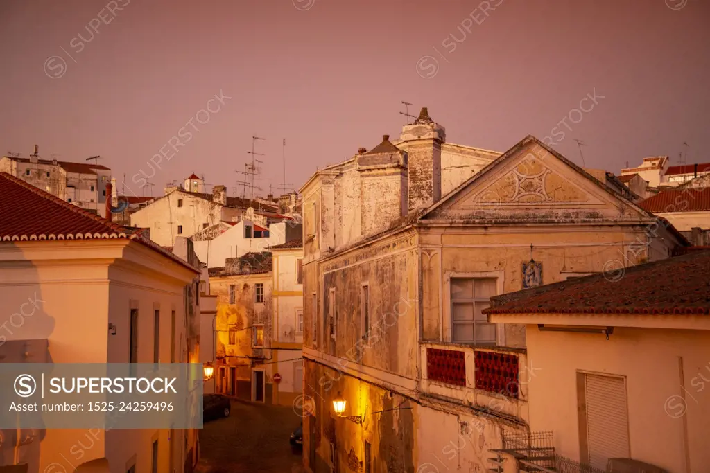 a small alley in the old town in the city of Elvas in Alentejo in Portugal.  Portugal, Elvas, October, 2021