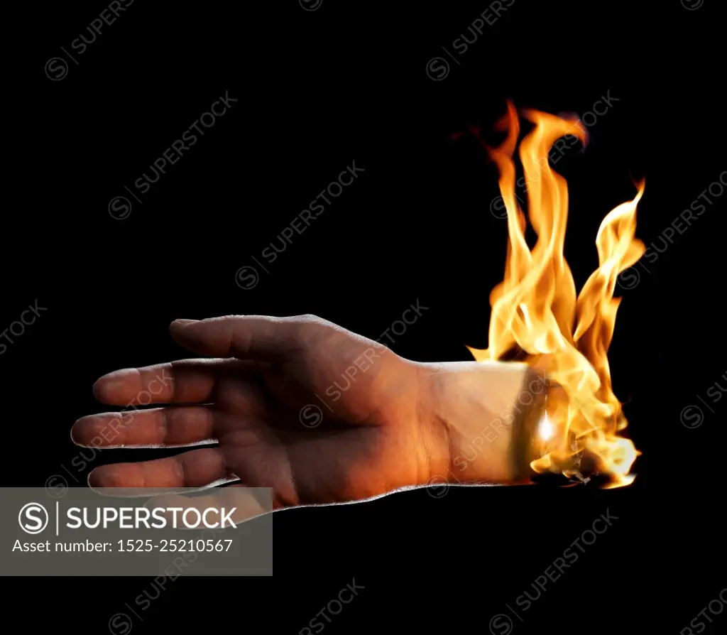 A Burning hand on black background.