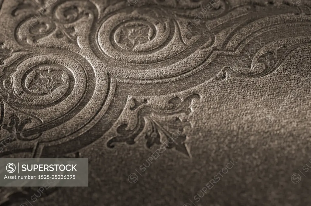 Sepia toned detail of an old book cover (Nya Illustrerade Magazin, printed in 1866)