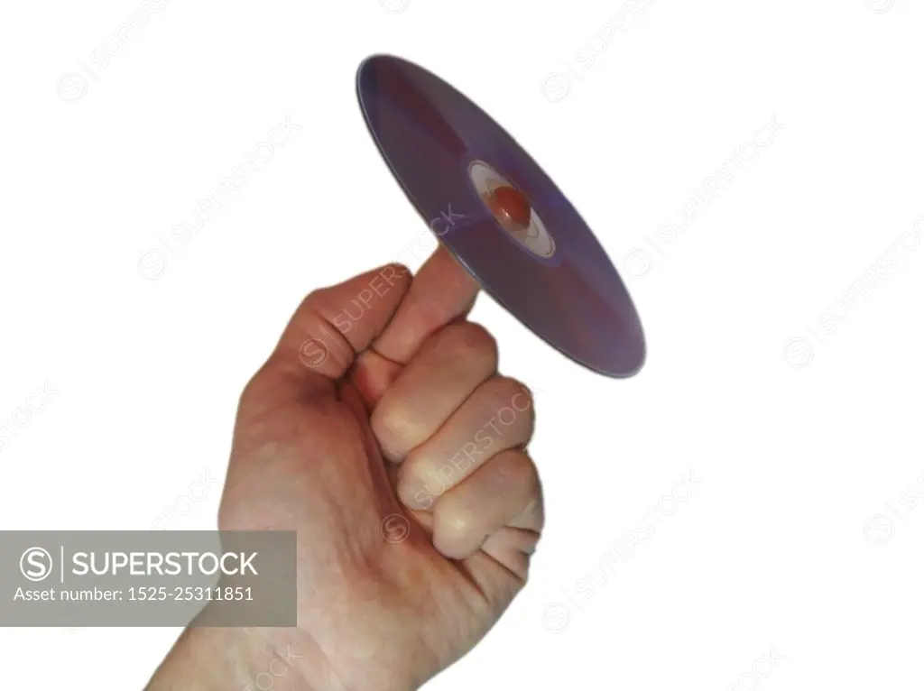 Compact disk and male finger isolated on the white background