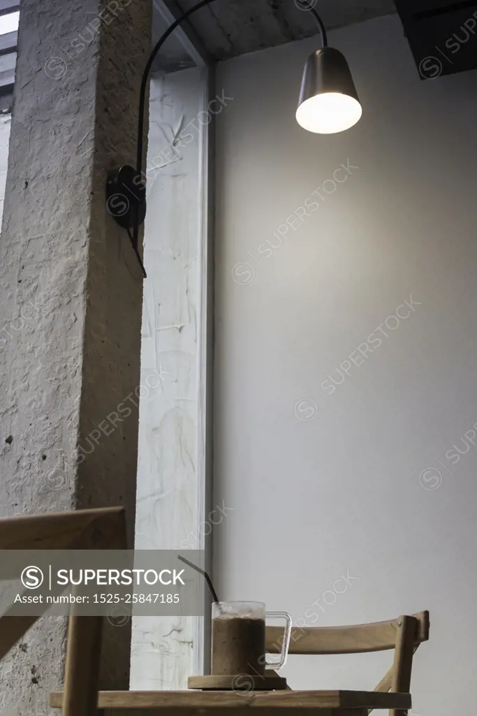 Iced milk mocha on wooden table, stock photo