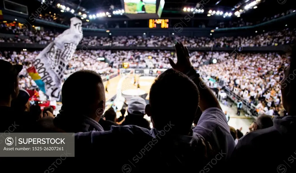 supporters cheering during a basketball game