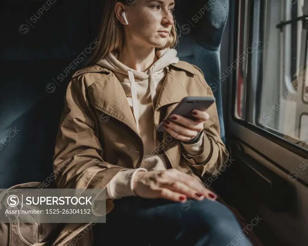 front view female passenger listening music