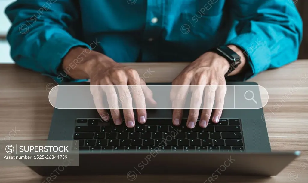 computer search technology concept Search Engine Optimization Man&rsquo;s hand using computer keyboard to search for information Using Search Console with a website