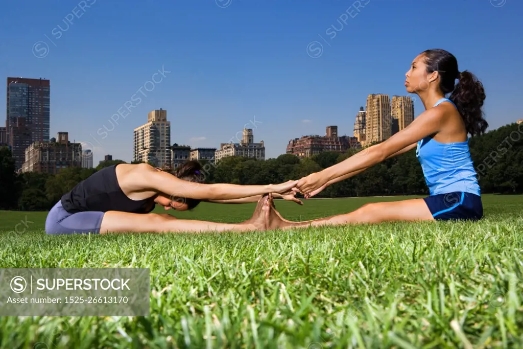 Female athletes stretching