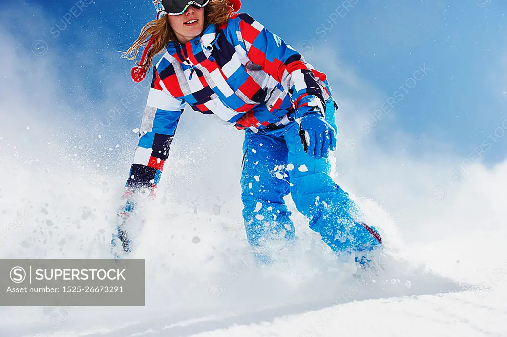 Female snowboarder in action