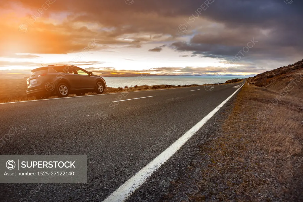 traveling car and beautiful scenic of lake pukaki in aoraki - mt.cook national park new zealand