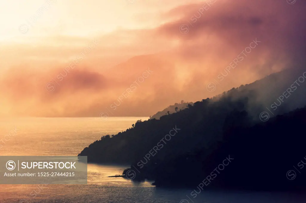 Beautiful Sunset at the Ocean Beach, New Zealand. Inspiring natural and travel background