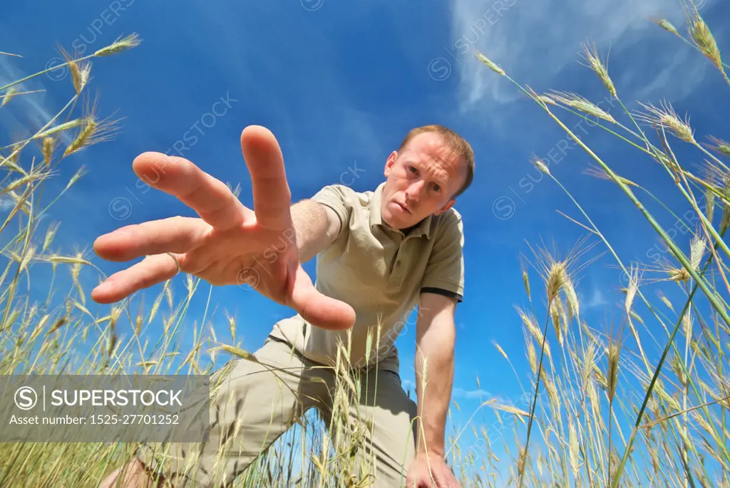 Man find some in grass