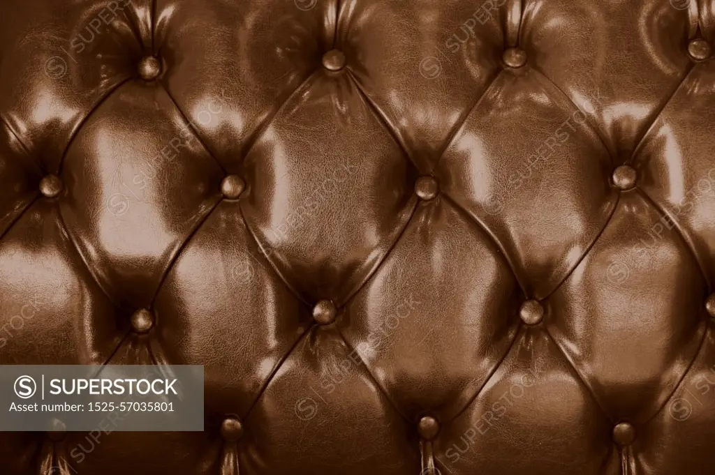 Sofa leather brown color vintage old texture furniture tile background.