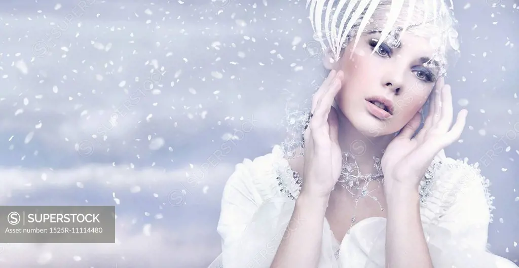 Beauty woman over winter background