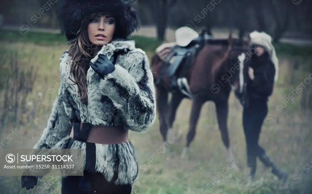 Beautiful young beauty posing on nature background