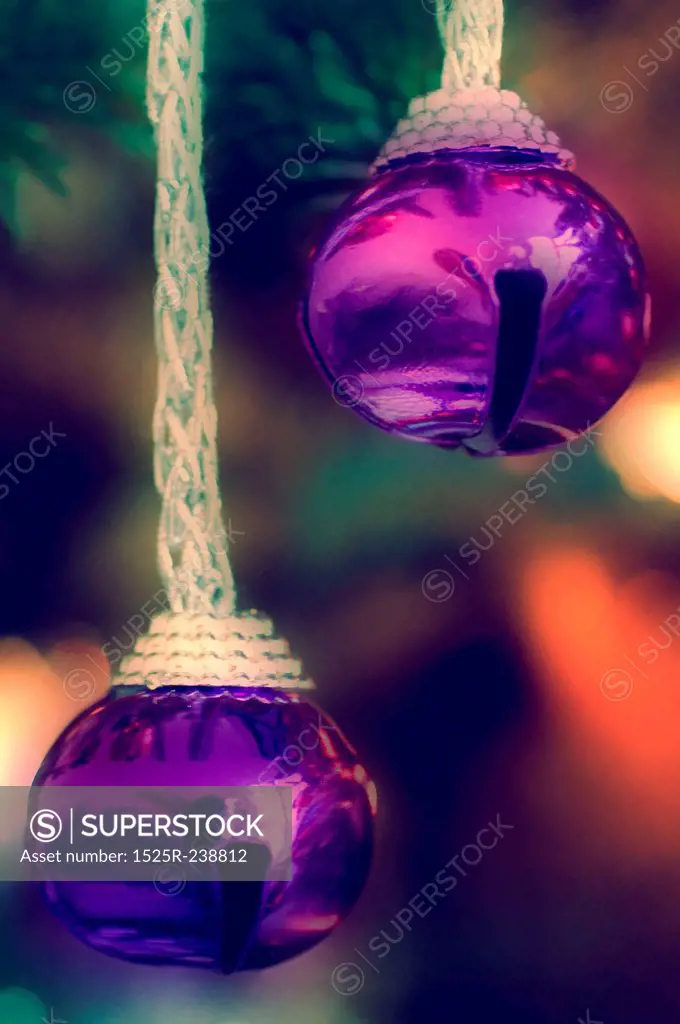 Two Small Purple Bells on Christmas Tree