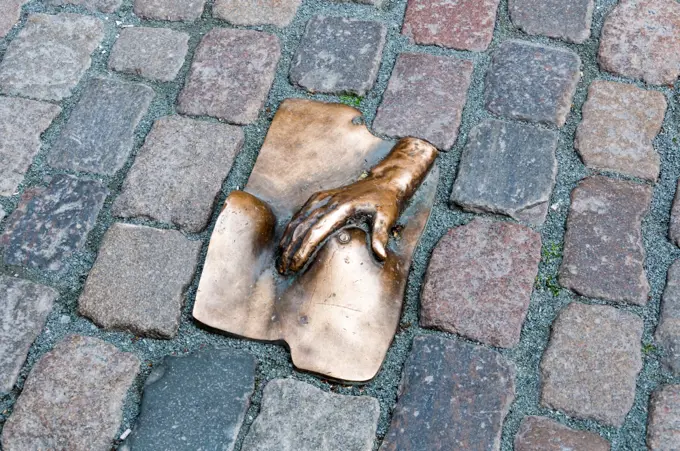 Famous art sculpture on a street in Amsterdam in the Red Light District