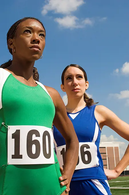 Two female track athletes