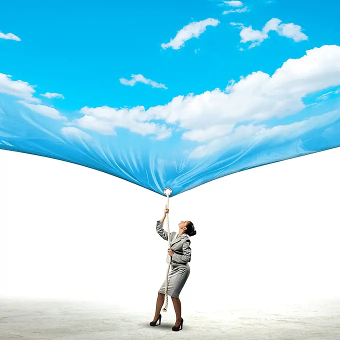 Businesswoman pulling banner