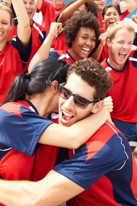 Sports Spectators In Team Colors Celebrating