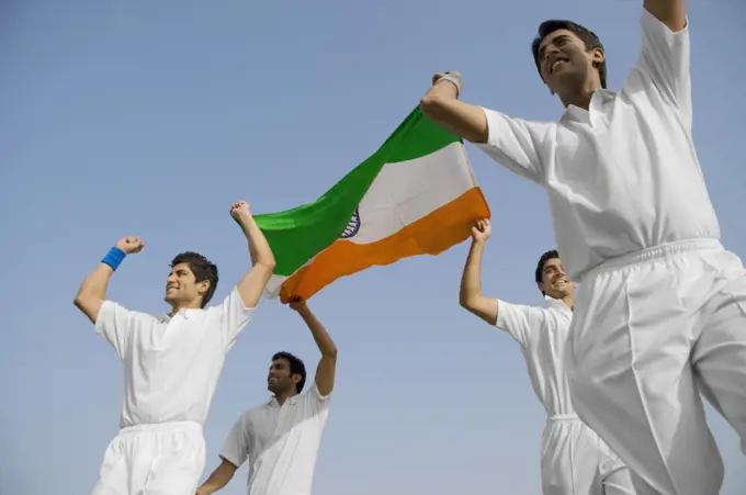 Players holding the national flag 