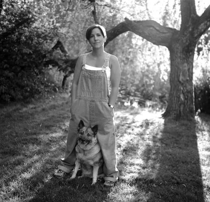 Woman Standing With Dog