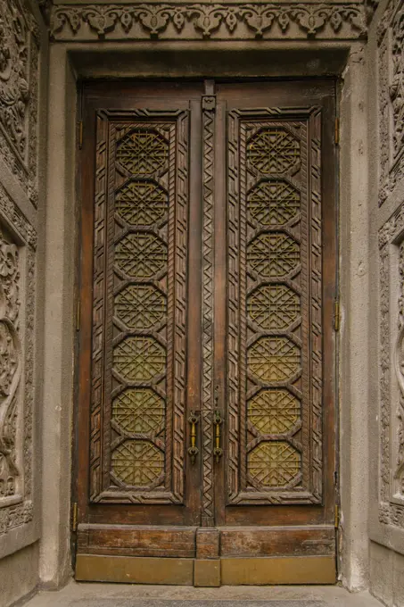 Old vintage door from 19th century in brown color in the center of Kyiv